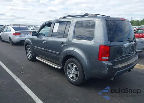 2011 Honda Pilot Touring из США, поврежденный, VIN 5FNYF4H96BB024397